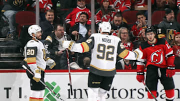 NEWARK, NEW JERSEY - DECEMBER 03: Chandler Stephenson #20 of the Vegas Golden Knights (L) scores at 5:24 of the second period against the New Jersey Devils and is joined by Tomas Nosek #92 (R) at the Prudential Center on December 03, 2019 in Newark, New Jersey. (Photo by Bruce Bennett/Getty Images)
