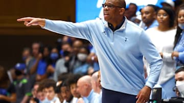 North Carolina head coach Hubert Davis coaches against the Duke basketball team (Photo by Jared C. Tilton/Getty Images)