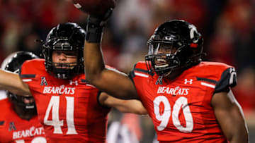 Cincinnati Bearcats defensive lineman Jabari Taylor reacts after recovering a fumble. USA Today.