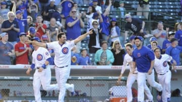 Jun 6, 2014; Chicago, IL, USA; The Chicago Cubs celebrate first baseman Anthony Rizzo (not pictured) walk-off two run homer against the Miami Marlins at Wrigley Field. The Chicago Cubs defeated the Miami Marlins 5-3 in 13 innings .Mandatory Credit: David Banks-USA TODAY Sports
