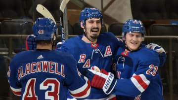 NEW YORK, NEW YORK - FEBRUARY 26: (l-r) Colin Blackwell #43, Chris Kreider #20 and Adam Fox #23 of the New York Rangers celebrate Kreider's second period goal against the Boston Bruins at Madison Square Garden on February 26, 2021 in New York City. (Photo by Bruce Bennett/Getty Images)
