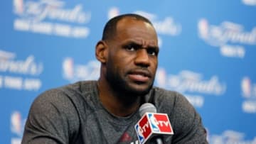 Jun 6, 2014; San Antonio, TX, USA; Miami Heat forward LeBron James answers questions during a news conference at Spurs Practice Facility. Mandatory Credit: Soobum Im-USA TODAY Sports