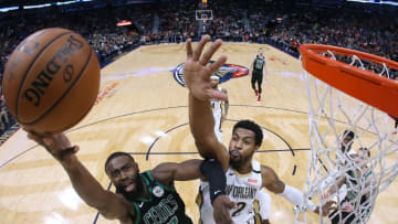 Jaylen Brown #7 of the Boston Celtics shoots against Derrick Favors #22 of the New Orleans Pelicans (Photo by Jonathan Bachman/Getty Images)