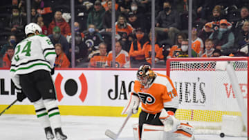 Jan 24, 2022; Philadelphia, Pennsylvania, USA; Dallas Stars left wing Roope Hintz (24) scores a goal past Philadelphia Flyers goaltender Carter Hart (79) during the first period at Wells Fargo Center. Mandatory Credit: Eric Hartline-USA TODAY Sports