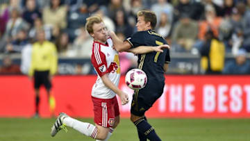 Oct 23, 2016; Philadelphia, PA, USA; New York Red Bulls midfielder Dax McCarty (11) collides with Philadelphia Union midfielder Brian Carroll (7) during the second half at Talen Energy Stadium. The Red Bulls won 2-0. Mandatory Credit: Derik Hamilton-USA TODAY Sports