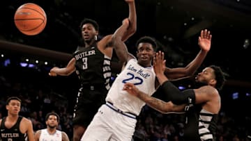 NEW YORK, NY - MARCH 08: Myles Cale #22 of the Seton Hall Pirates fights for the ball with Kamar Baldwin #3 and Tyler Wideman #4 of the Butler Bulldogs during quarterfinals of the Big East Basketball Tournament at Madison Square Garden on March 8, 2018 in New York City.The Butler Bulldogs defeated the Seton Hall Pirates 75-74. (Photo by Elsa/Getty Images)