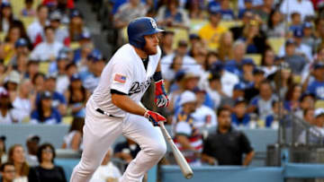 LOS ANGELES, CA - JULY 04: Max Muncy #13 of the Los Angeles Dodgers leaves the batter's box on a single in the third inning of the game against the Pittsburgh Pirates at Dodger Stadium on July 4, 2018 in Los Angeles, California. (Photo by Jayne Kamin-Oncea/Getty Images)