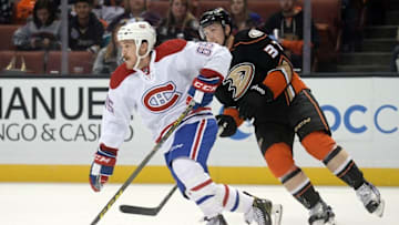 November 29, 2016; Anaheim, CA, USA; Montreal Canadiens center Andrew Shaw (65) moves the puck ahead of Anaheim Ducks left wing Nick Ritchie (37) during the second period at Honda Center. Mandatory Credit: Gary A. Vasquez-USA TODAY Sports