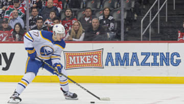 Apr 11, 2023; Newark, New Jersey, USA; Buffalo Sabres right wing JJ Peterka (77) skates with the puck during the second period against the New Jersey Devils at Prudential Center. Mandatory Credit: Vincent Carchietta-USA TODAY Sports