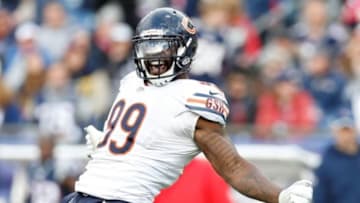 Oct 26, 2014; Foxborough, MA, USA; Chicago Bears defensive end Lamarr Houston (99) celebrates after sacking New England Patriots quarterback Jimmy Garoppolo (not pictured) during the fourth quarter at Gillette Stadium. The Patriots won 51-23. Mandatory Credit: Greg M. Cooper-USA TODAY Sports