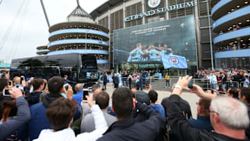 MANCHESTER, ENGLAND - AUGUST 19: Man City fans watch the team arrive during the Premier League match between Manchester City and Huddersfield Town at Etihad Stadium on August 19, 2018 in Manchester, United Kingdom. (Photo by Alex Livesey/Getty Images)