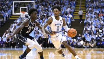 CHAPEL HILL, NORTH CAROLINA - FEBRUARY 05: A.J. Griffin #21 of the Duke Blue Devils defends Leaky Black #1 of the North Carolina Tar Heels during their game at the Dean E. Smith Center on February 05, 2022 in Chapel Hill, North Carolina. Duke won 87-67. (Photo by Grant Halverson/Getty Images)