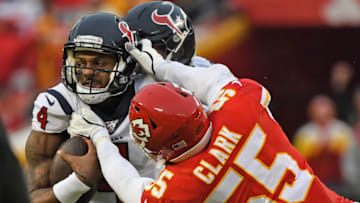 KANSAS CITY, MISSOURI - JANUARY 12: Defensive end Frank Clark #55 of the Kansas City Chiefs sacks quarterback Deshaun Watson #4 of the Houston Texans in the second half during the AFC Divisional playoff game at Arrowhead Stadium on January 12, 2020 in Kansas City, Missouri. (Photo by Peter G. Aiken/Getty Images)