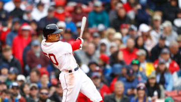 BOSTON, MASSACHUSETTS - APRIL 28: Mookie Betts #50 of the Boston Red Sox hits a double in the bottom of the sixth inning of the game against the Tampa Bay Rays at Fenway Park on April 28, 2019 in Boston, Massachusetts. (Photo by Omar Rawlings/Getty Images)