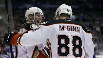 Mar 24, 2016; Toronto, Ontario, CAN; Anaheim Ducks forward Corey Perry (10) congratulates forward Jamie McGinn (88) on his goal against the Toronto Maple Leafs during the first period at the Air Canada Centre. Mandatory Credit: John E. Sokolowski-USA TODAY Sports