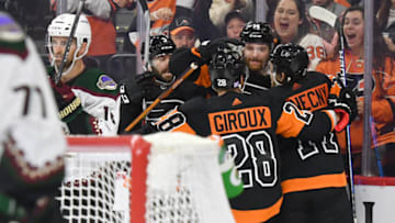 Nov 2, 2021; Philadelphia, Pennsylvania, USA; Philadelphia Flyers center Sean Couturier (14) celebrates his goal with teammates against the Arizona Coyotes during the third period at Wells Fargo Center. Mandatory Credit: Eric Hartline-USA TODAY Sports