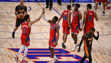 Detroit Pistons guard Cade Cunningham (2) and guard Hamidou Diallo (6) high five Credit: Tim Fuller-USA TODAY Sports