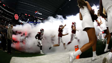 ARLINGTON, TX - DECEMBER 2: The Oklahoma Sooners take the field before playing the TCU Horned Frogs during the first half at AT