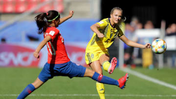 RENNES, FRANCE - JUNE 11: Magdalena Eriksson of Sweden passes the ball past Daniela Zamora of Chile during the 2019 FIFA Women's World Cup France group F match between Chile and Sweden at Roazhon Park on June 11, 2019 in Rennes, France. (Photo by Richard Heathcote/Getty Images)