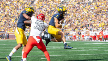 ANN ARBOR, MICHIGAN - SEPTEMBER 09: Roman Wilson #1 of the Michigan Wolverines scores a touchdown during the first half of a college football game against the UNLV Rebels at Michigan Stadium on September 09, 2023 in Ann Arbor, Michigan. (Photo by Aaron J. Thornton/Getty Images)