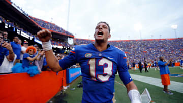 Sep 16, 2017; Gainesville, FL, USA; Florida Gators quarterback Feleipe Franks (13) celebrates with fans as they beat the Tennessee Volunteers at Ben Hill Griffin Stadium. Mandatory Credit: Kim Klement-USA TODAY Sports