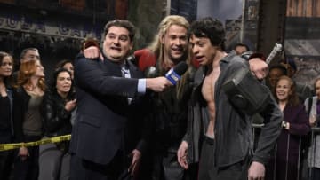 SATURDAY NIGHT LIVE -- 'Chris Hemsworth' Episode 1677 -- Pictured: (l-r) Bobby Moynihan as Danny Powell, Chris Hemsworth as Thor and Pete Davidson as Dr. Bruce Banner during the 'Avengers News Report' skit on March 7, 2015 -- (Photo by: Dana Edelson/NBC/NBCU Photo Bank via Getty Images)