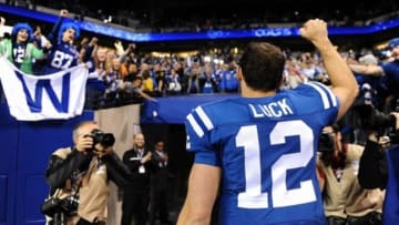 Oct 20, 2013; Indianapolis, IN, USA; Indianapolis Colts quarterback Andrew Luck (12) waves to the crowd as he leaves the field after the game against the Denver Broncos at Lucas Oil Stadium. Mandatory Credit: Ron Chenoy-USA TODAY Sports