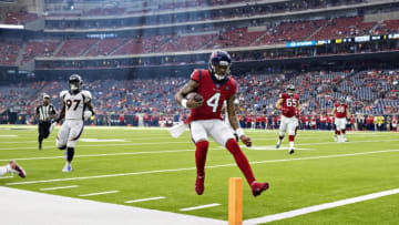 HOUSTON, TX - DECEMBER 8: Deshaun Watson #4 of the Houston Texans scores a touchdown during the second half of a game against the Denver Broncos at NRG Stadium on December 8, 2019 in Houston, Texas. The Broncos defeated the Texans 38-24. (Photo by Wesley Hitt/Getty Images)