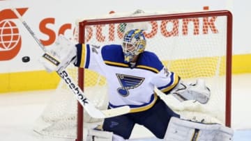 Nov 23, 2014; Winnipeg, Manitoba, CAN; St. Louis Blues goalie Jake Allen (34) makes a save during the first period against the Winnipeg Jets at MTS Centre. Mandatory Credit: Bruce Fedyck-USA TODAY Sports