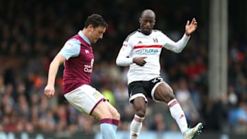 LONDON, ENGLAND - APRIL 17: Tommy Elphick of Aston Villa and Sone Aluko of Fulham in action during the Sky Bet Championship match between Fulham and Aston Villa at Craven Cottage on April 17, 2017 in London, England. (Photo by Alex Pantling/Getty Images)
