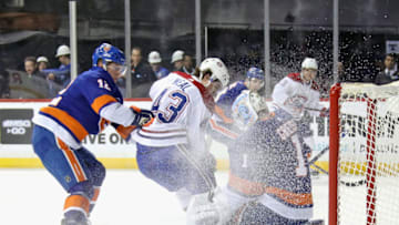 NEW YORK, NEW YORK - MARCH 03: Thomas Greiss #1 of the New York Islanders makes the first period stop on Jordan Weal #43 of the Montreal Canadiens at the Barclays Center on March 03, 2020 in the Brooklyn borough of New York City. (Photo by Bruce Bennett/Getty Images)