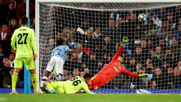 MANCHESTER, ENGLAND - OCTOBER 01: Raheem Sterling of Manchester City scores his team's first goal during the UEFA Champions League group C match between Manchester City and Dinamo Zagreb at Etihad Stadium on October 01, 2019 in Manchester, United Kingdom. (Photo by Clive Brunskill/Getty Images)
