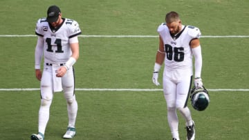 Sep 13, 2020; Landover, Maryland, USA; Philadelphia Eagles quarterback Carson Wentz (11) and Eagles tight end Zach Ertz (86) walk off the field after their game against the Washington Football Team at FedExField. Mandatory Credit: Geoff Burke-USA TODAY Sports
