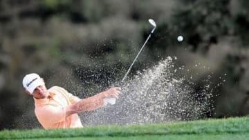 January 24, 2013; La Jolla, CA, USA; Shawn Stefani hits out of the bunker on the 15th hole during the first round of the Farmers Insurance Open at Torrey Pines. Mandatory Credit: Photo By Christopher Hanewinckel-USA TODAY Sports