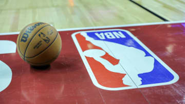 LAS VEGAS, NEVADA - JULY 07: A basketball is placed on the court next to an NBA logo during a break in the first half of a 2023 NBA Summer League game between the Portland Trail Blazers and the Houston Rockets at the Thomas & Mack Center on July 07, 2023 in Las Vegas, Nevada. NOTE TO USER: User expressly acknowledges and agrees that, by downloading and or using this photograph, User is consenting to the terms and conditions of the Getty Images License Agreement. (Photo by Ethan Miller/Getty Images)