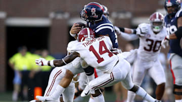 OXFORD, MS - SEPTEMBER 15: Deionte Thompson #14 of the Alabama Crimson Tide and Xavier McKinney #15 force a fumble on Jordan Ta'amu #10 of the Mississippi Rebels during the first half at Vaught-Hemingway Stadium on September 15, 2018 in Oxford, Mississippi. (Photo by Jonathan Bachman/Getty Images)