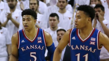 AUSTIN, TEXAS - JANUARY 29: Quentin Grimes #5 and Devon Dotson #11 of the Kansas Jayhawks play defense against the Texas Longhorns at The Frank Erwin Center on January 29, 2019 in Austin, Texas. (Photo by Chris Covatta/Getty Images)