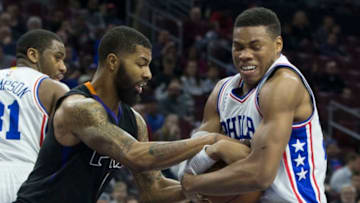 PHILADELPHIA, PA - JANUARY 26: Markieff Morris #11 of the Phoenix Suns and Richaun Holmes #22 of the Philadelphia 76ers fight for the ball on January 26, 2016 at the Wells Fargo Center in Philadelphia, Pennsylvania. The 76ers defeated the Suns 113-103. NOTE TO USER: User expressly acknowledges and agrees that, by downloading and or using this photograph, User is consenting to the terms and conditions of the Getty Images License Agreement. (Photo by Mitchell Leff/Getty Images)
