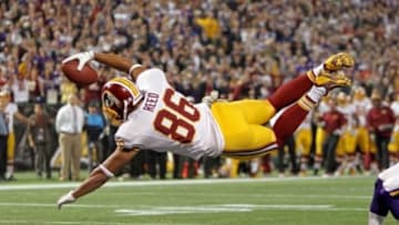 Nov 7, 2013; Minneapolis, MN, USA; Washington Redskins tight end Jordan Reed (86) dives for a touchdown pass during the second quarter against the Minnesota Vikings at Mall of America Field at H.H.H. Metrodome. Mandatory Credit: Brace Hemmelgarn-USA TODAY Sports