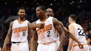 Nov 1, 2013; Phoenix, AZ, USA; Phoenix Suns guard Eric Bledsoe (2) is congratulated by teammates forward Markieff Morris (11) and guard Dionte Christmas (25) after scoring the game winning 3 point basket against the Utah Jazz in the second half at US Airways Center. The Suns defeated the Jazz 87-84. Mandatory Credit: Jennifer Stewart-USA TODAY Sports