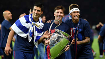 BERLIN, GERMANY - JUNE 06: (L-R) Luis Suarez, Lionel Messi and Neymar of Barcelona celebrate with the trophy after the UEFA Champions League Final between Juventus and FC Barcelona at Olympiastadion on June 6, 2015 in Berlin, Germany. (Photo by Matthias Hangst/Getty Images)