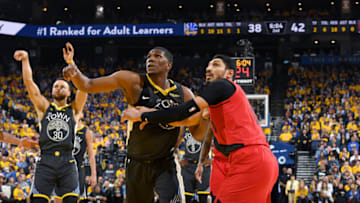 OAKLAND, CA - MAY 16: Kevon Looney #5 of the Golden State Warriors and Enes Kanter #00 of the Portland Trail Blazers fight for position during Game Two of the Western Conference Finals on May 16, 2019 at ORACLE Arena in Oakland, California. NOTE TO USER: User expressly acknowledges and agrees that, by downloading and/or using this photograph, user is consenting to the terms and conditions of Getty Images License Agreement. Mandatory Copyright Notice: Copyright 2019 NBAE (Photo by Andrew D. Bernstein/NBAE via Getty Images)