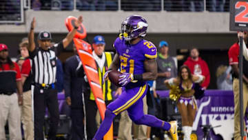 Dec 1, 2016; Minneapolis, MN, USA; Minnesota Vikings running back Jerick McKinnon (21) scores in the fourth quarter against the Dallas Cowboys at U.S. Bank Stadium. The Dallas Cowboys beat the Minnesota Vikings 17-15. Mandatory Credit: Brad Rempel-USA TODAY Sports