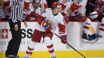 VANCOUVER, BC - DECEMBER 28: Alexander Romanov #26 of Russia skates with the puck in Group A hockey action of the 2019 IIHF World Junior Championship action against the Czech Republic on December, 28, 2018 at Rogers Arena in Vancouver, British Columbia, Canada. (Photo by Rich Lam/Getty Images)
