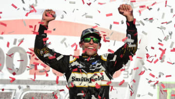 TALLADEGA, AL - OCTOBER 14: Aric Almirola, driver of the #10 Smithfield Bacon for Life Ford, celebrates in Victory Lane after winning the Monster Energy NASCAR Cup Series 1000Bulbs.com 500 at Talladega Superspeedway on October 14, 2018 in Talladega, Alabama. (Photo by Jared C. Tilton/Getty Images)