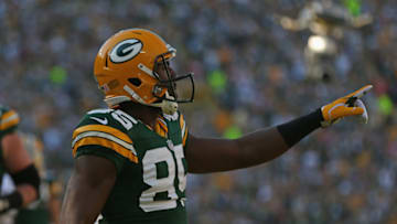 GREEN BAY, WI - SEPTEMBER 30: Greg Jennings #85 of the Green Bay Packers celebrates a touchdown catch against the New Orleans Saints at Lambeau Field on September 30, 2012 in Green Bay, Wisconsin. The Packers defeated the Sanits 28-27. (Photo by Jonathan Daniel/Getty Images)