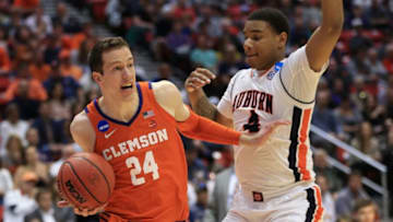SAN DIEGO, CA - MARCH 18: David Skara #24 of the Clemson Tigers drives against Chuma Okeke #4 of the Auburn Tigers in the first half during the second round of the 2018 NCAA Men's Basketball Tournament at Viejas Arena on March 18, 2018 in San Diego, California. (Photo by Sean M. Haffey/Getty Images)