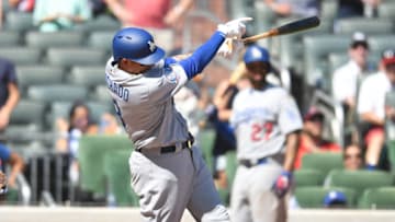 ATLANTA, GA - JULY 29: Manny Machado #8 of the Los Angeles Dodgers knocks in a run with a ninth inning single against the Atlanta Braves at SunTrust Park on July 29, 2018 in Atlanta, Georgia. (Photo by Scott Cunningham/Getty Images)