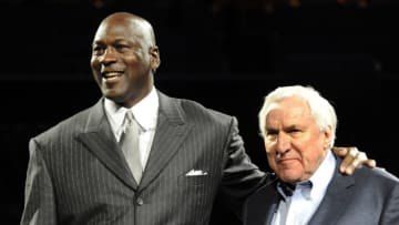 December 14, 2010; Charlotte, NC, USA; Charlotte Bobcats team owner Michael Jordan (left) poses with former head coach Dean Smith after being inducted into the North Carolina sports Hall of Fame during the half time in the game against the Toronto Raptors at Time Warner Cable Arena. Mandatory Credit: Sam Sharpe-USA TODAY Sports