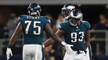 ARLINGTON, TX - NOVEMBER 19: Tim Jernigan #93 of the Philadelphia Eagles celebrates with Vinny Curry #75 in the second half against the Dallas Cowboys at AT&T Stadium on November 19, 2017 in Arlington, Texas. (Photo by Ronald Martinez/Getty Images)